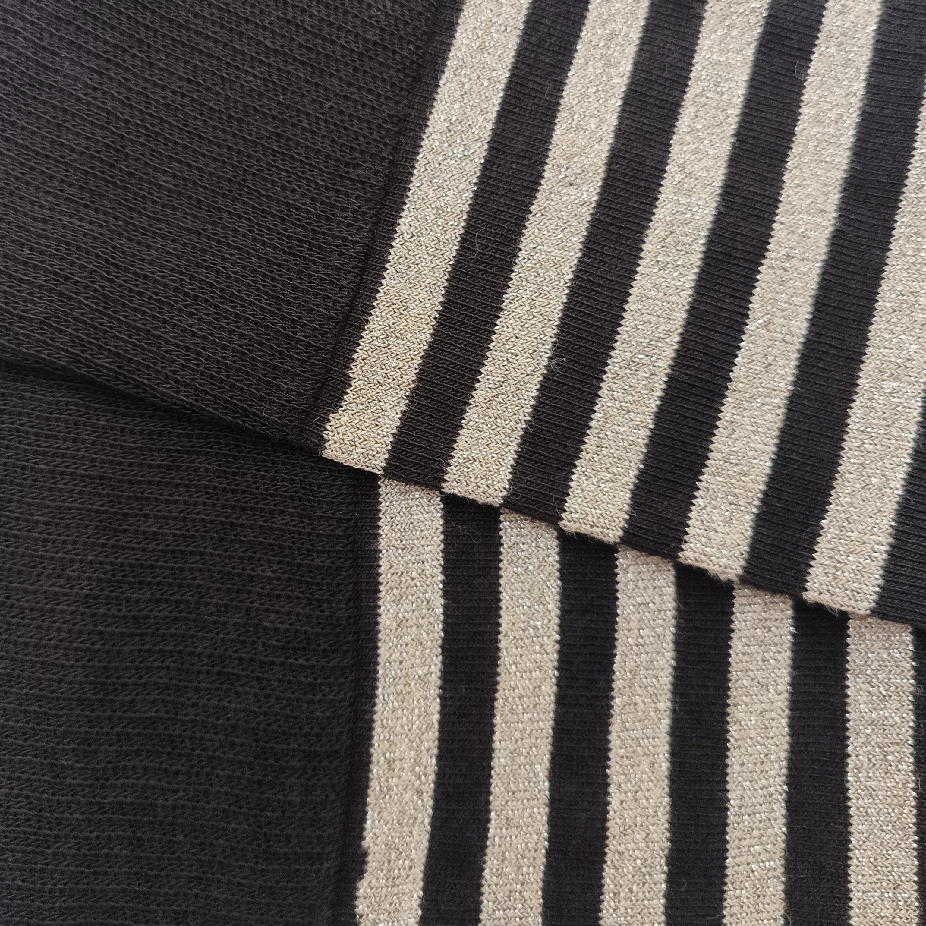 High-waisted, shiny, fine-striped, raw, black.